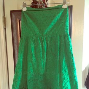Cute green strapless dress.